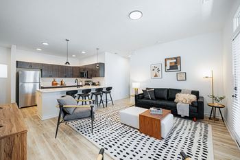 a living room with a couch and a table